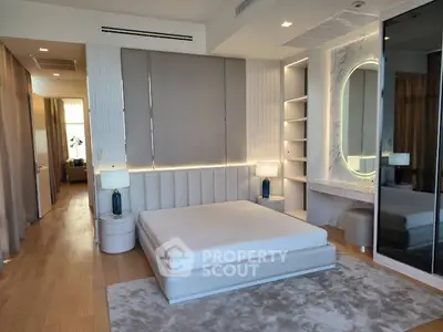 Luxurious modern bedroom with elegant lighting and stylish decor