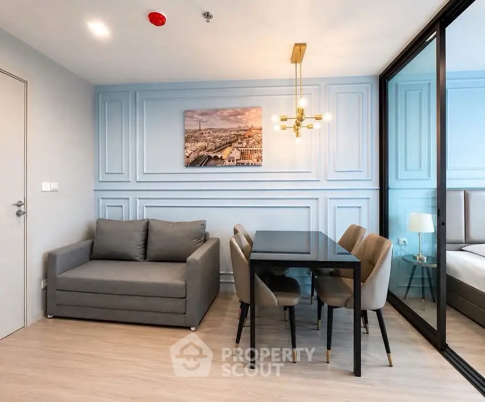 Modern living room with elegant dining area and stylish decor