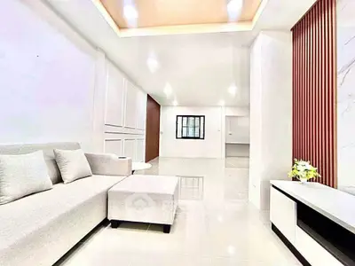 Spacious modern living room with elegant decor and ample natural light