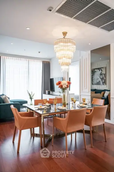 Luxurious modern dining room with elegant chandelier and stylish decor