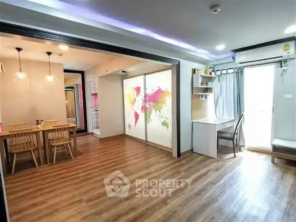 Spacious open-plan living area with modern dining set and vibrant world map decor.