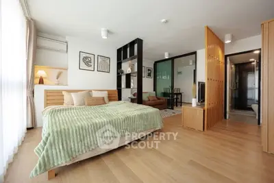 Spacious modern bedroom with open layout and stylish decor