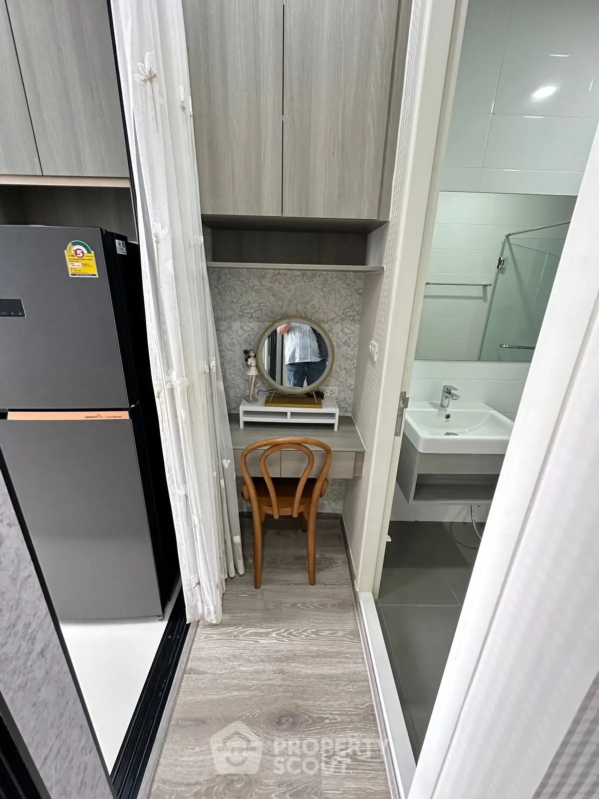 Compact modern apartment with sleek kitchen and cozy bathroom