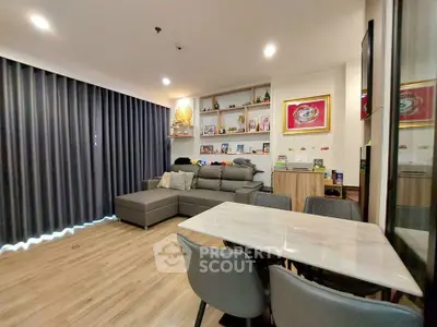 Modern living room with stylish decor and comfortable seating in a cozy apartment.