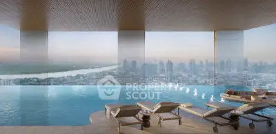 Luxurious rooftop infinity pool with stunning city skyline view, perfect for relaxation and leisure.