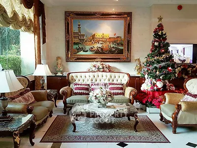 Luxurious living room with elegant furniture and festive Christmas decor
