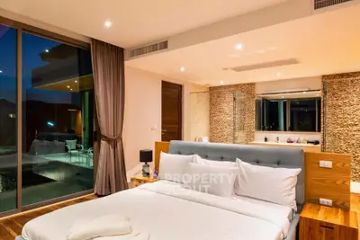 Luxurious modern bedroom with large windows and elegant decor