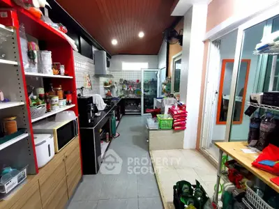 Spacious kitchen with modern appliances and ample storage space