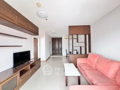 Spacious living room with modern furniture and built-in TV unit