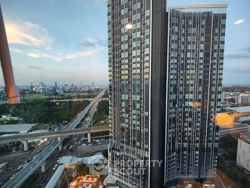 Stunning high-rise building with panoramic city views and modern architecture.