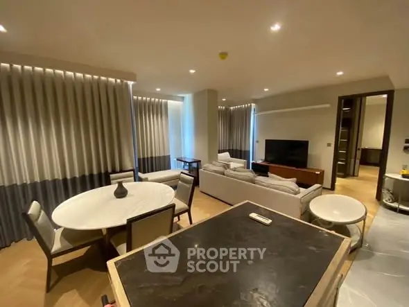 Luxurious modern living room with elegant dining area and stylish decor