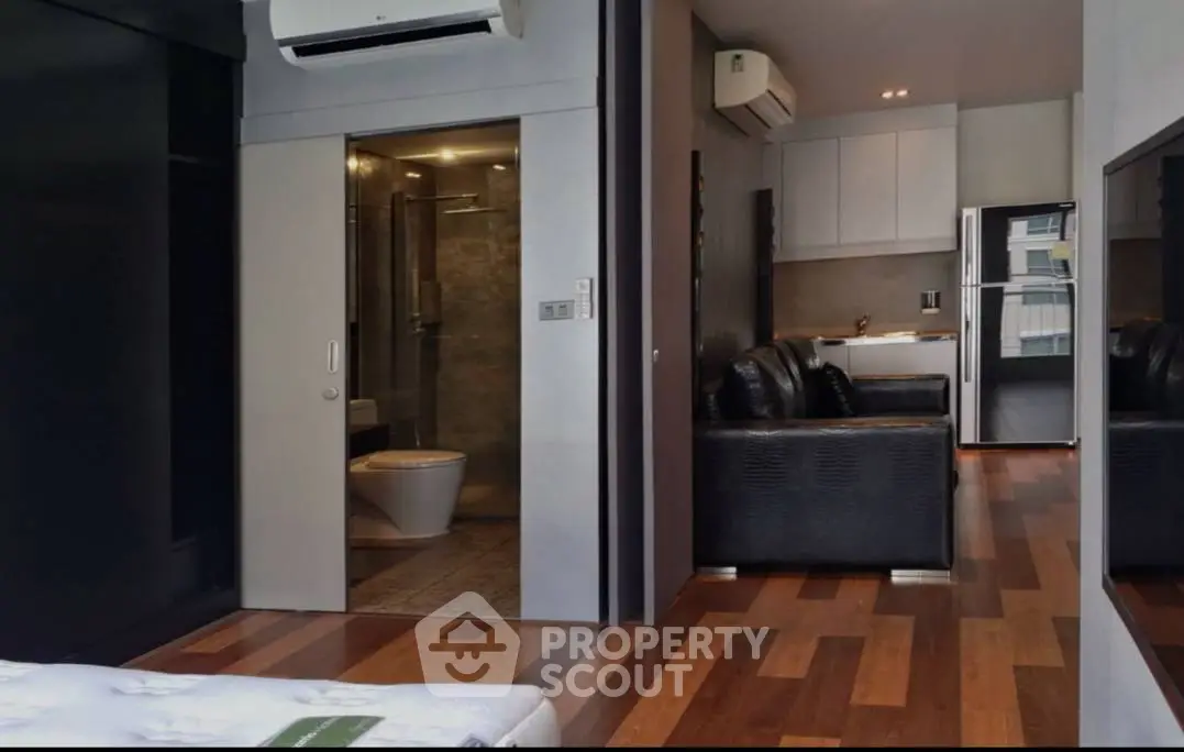 Modern apartment interior with sleek design and wooden flooring