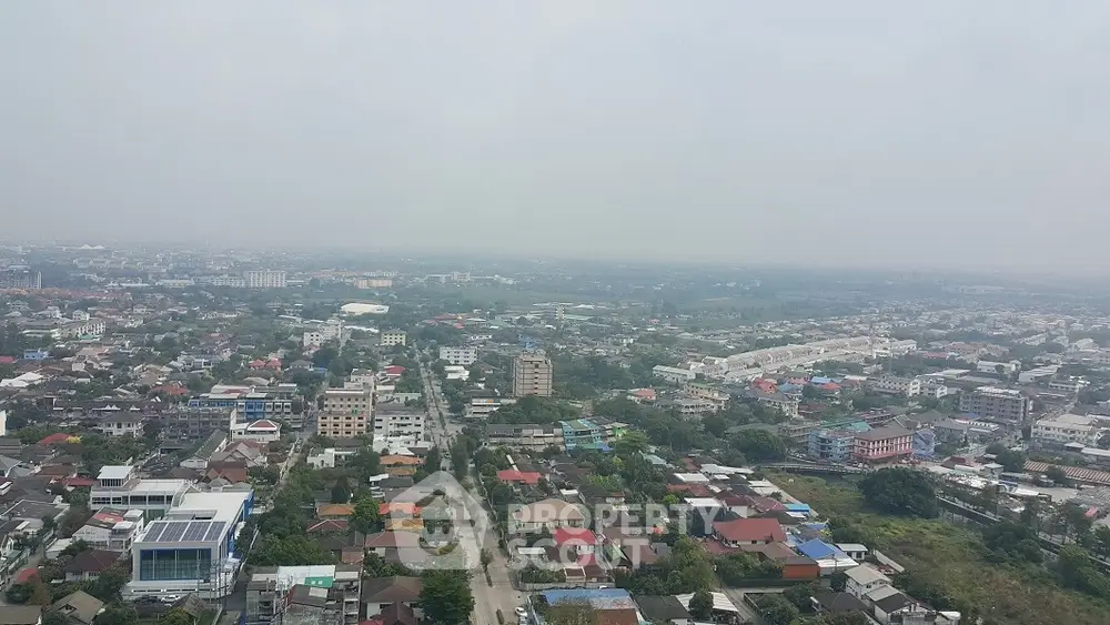 Panoramic cityscape view showcasing a sprawling urban landscape with diverse architecture.