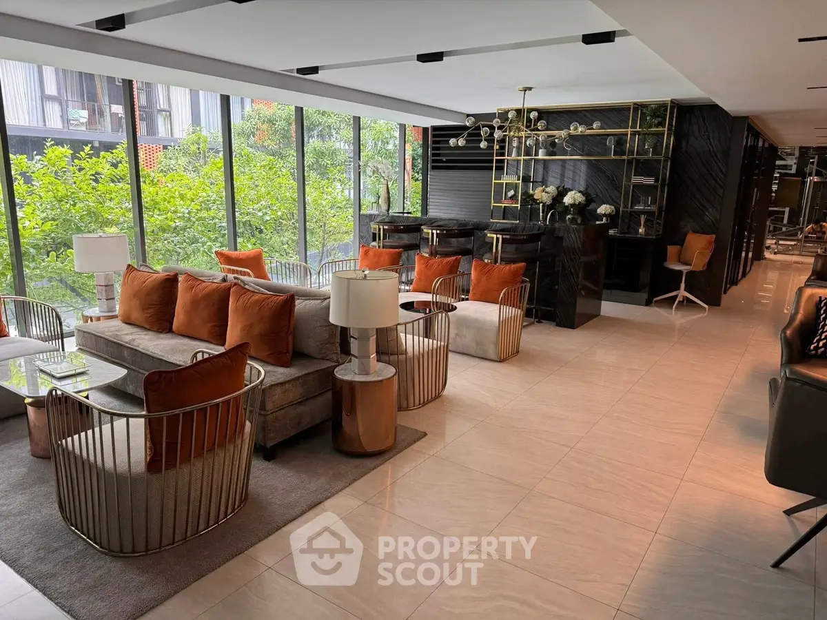 Luxurious modern living room with floor-to-ceiling windows and stylish decor