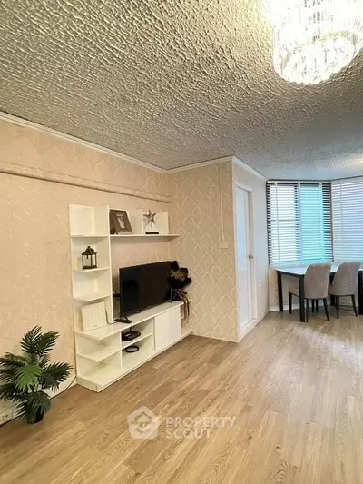 Elegant living room with modern decor and natural light