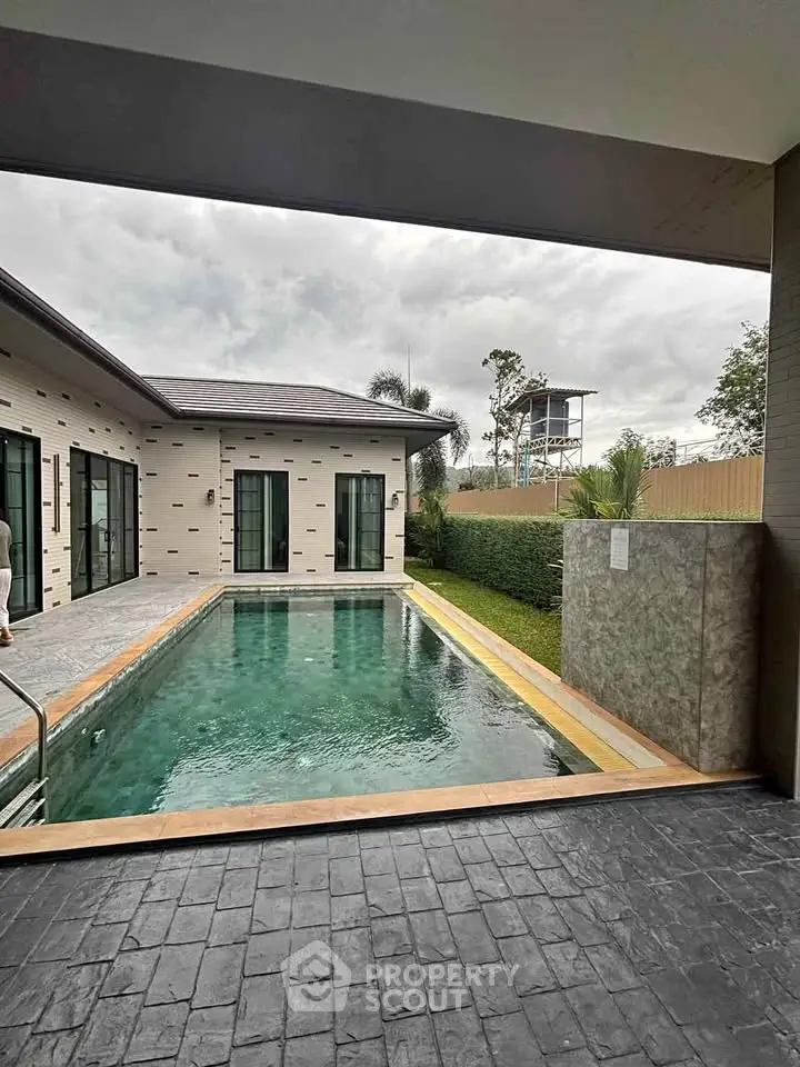 Luxurious villa with private pool and modern architecture, perfect for serene living.