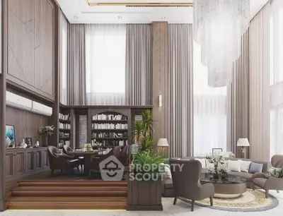 Luxurious living room with high ceilings, elegant chandelier, and sophisticated decor
