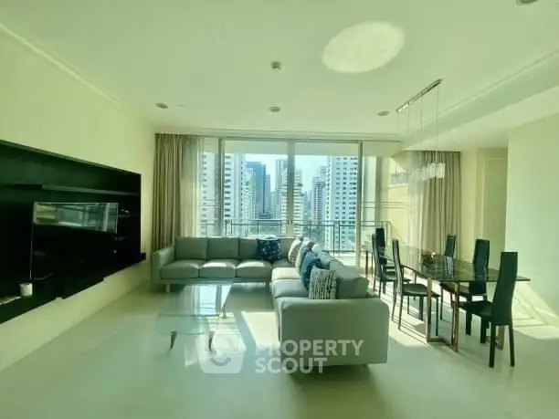 Spacious living room with modern furniture and city view in luxury apartment
