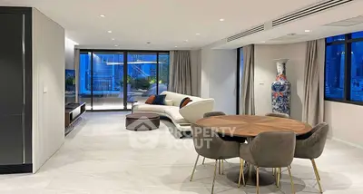 Luxurious modern living room with elegant decor and city view