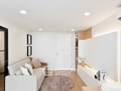 Modern living room with cozy sofa and stylish decor in a bright apartment
