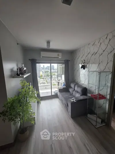 Modern living room with stylish decor and city view from balcony