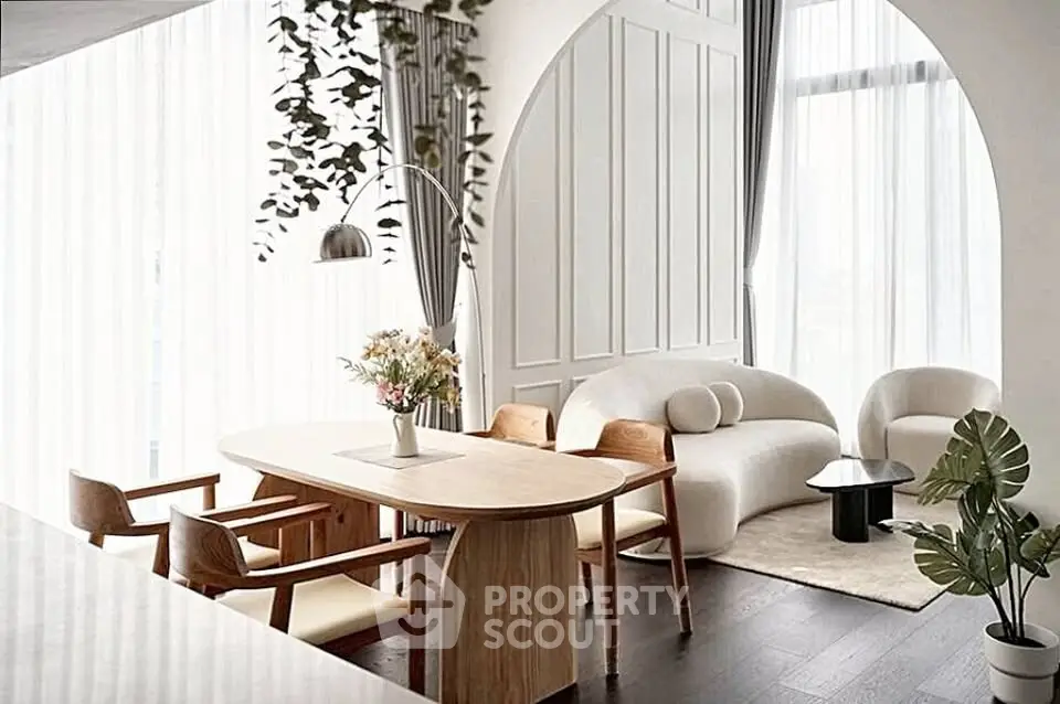 Elegant modern living room with stylish furniture and natural light