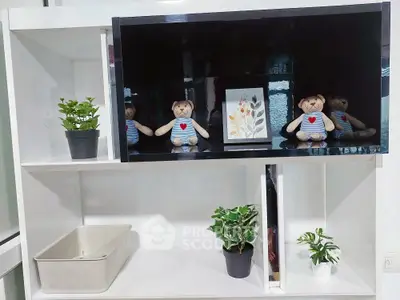 Modern living room with stylish shelving and decorative plants