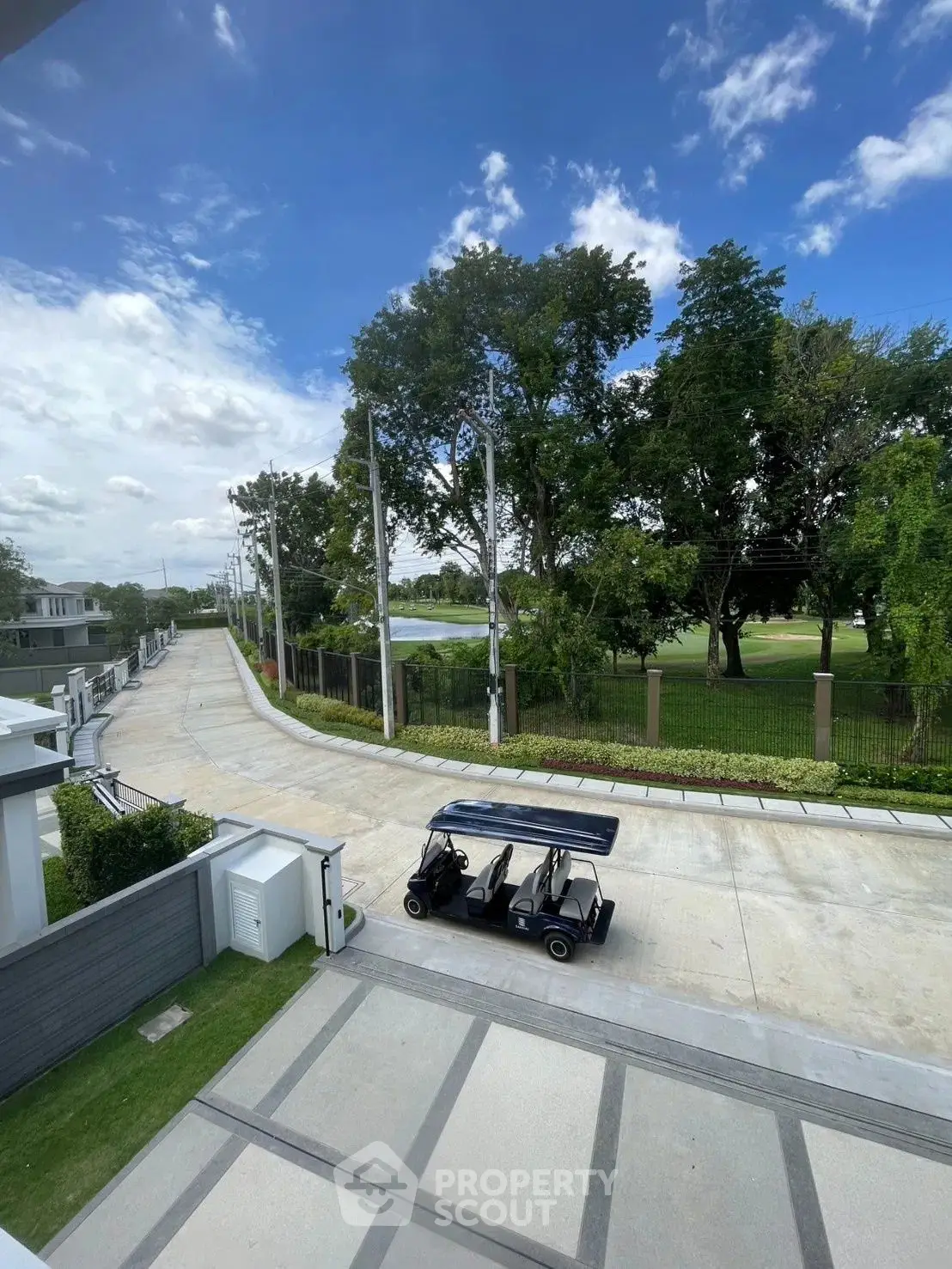 Luxurious residential area with golf course view and electric carts