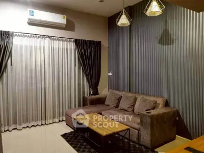 Modern living room with stylish lighting and comfortable sofa