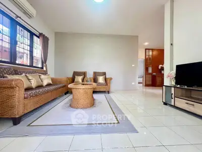 Spacious living room with elegant furniture and natural light