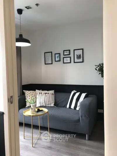Cozy living room with modern decor and stylish furniture, perfect for relaxation and entertaining guests.