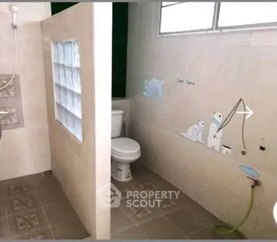 Charming bathroom with playful polar bear tiles and modern shower design.