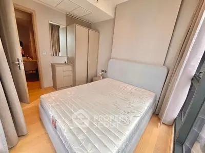 Modern bedroom with stylish furniture and natural light