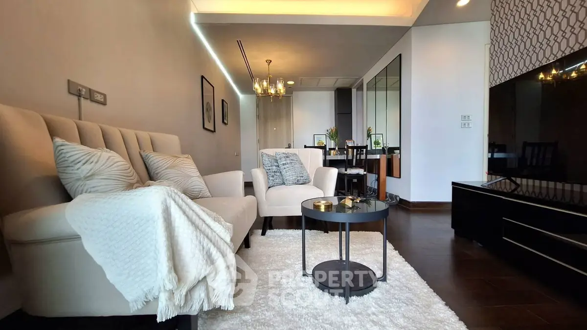 Elegant living room with modern decor and cozy seating area