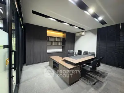 Modern office space with sleek furniture and ambient lighting