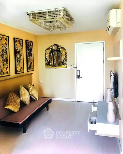 Chic living room with elegant decor and modern furnishings in a cozy apartment.