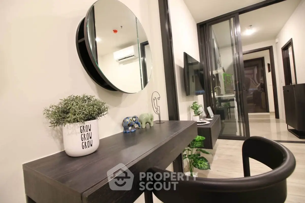 Modern living room with stylish decor and sleek furniture in a contemporary apartment.