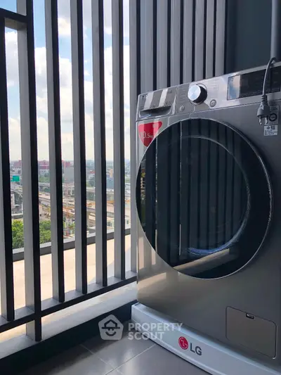 Modern balcony with city view and sleek washing machine