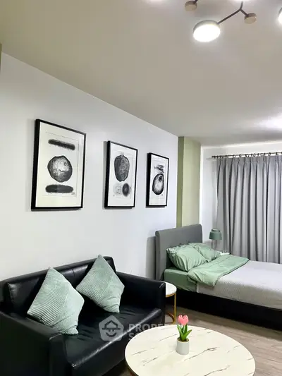 Modern studio apartment with stylish decor and cozy ambiance