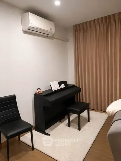 Cozy living room with piano and modern decor, perfect for music lovers.