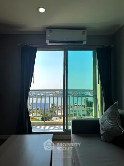 Modern living room with stunning balcony view and air conditioning
