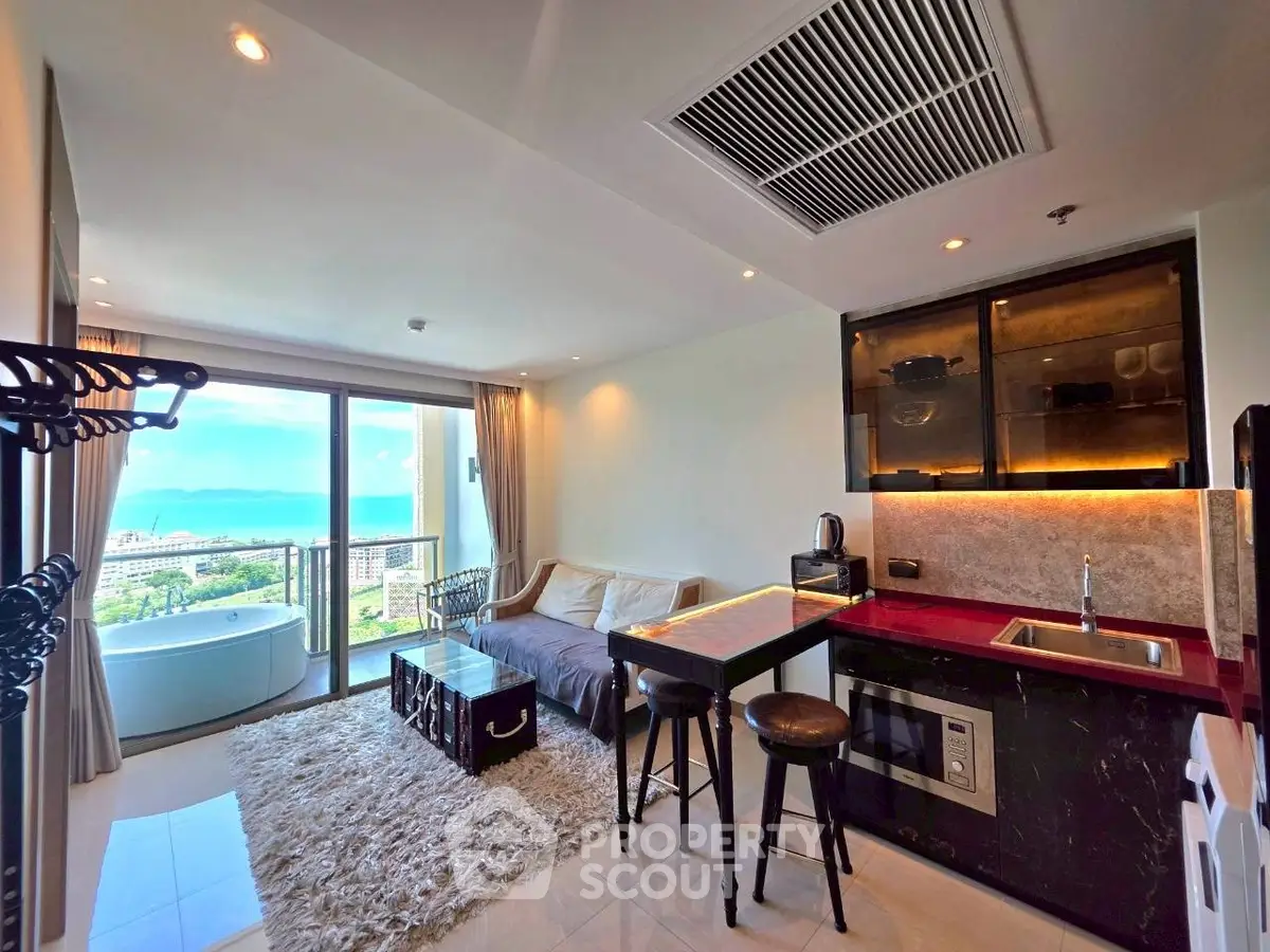 Modern studio apartment with ocean view and stylish interior design
