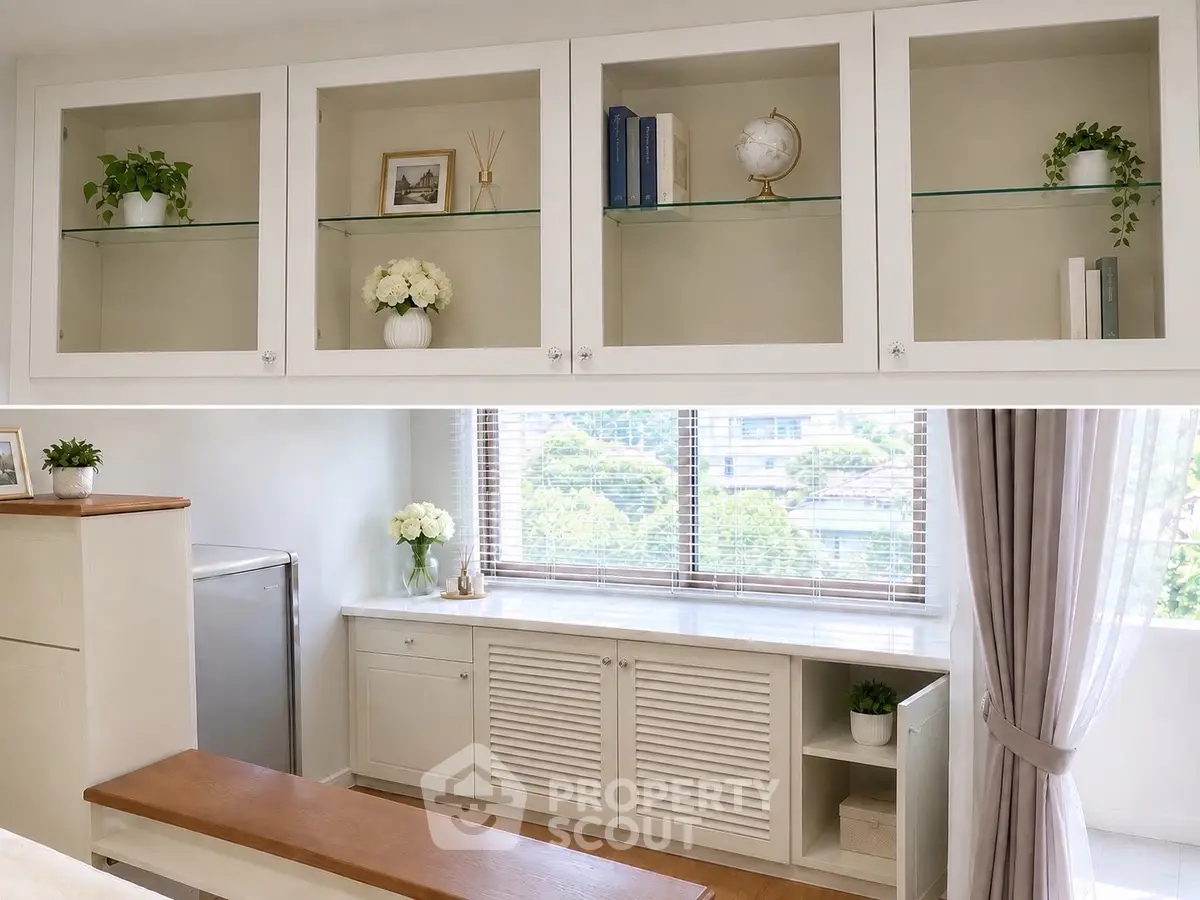 Elegant living room with built-in shelves and large window view