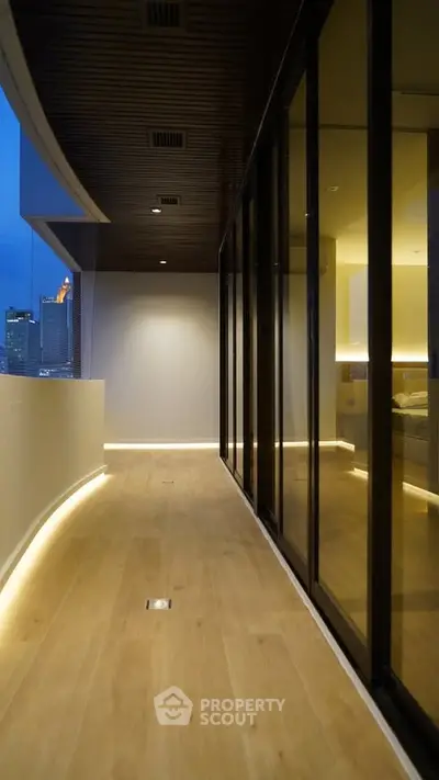 Luxurious modern balcony with city view and elegant lighting, perfect for urban living.