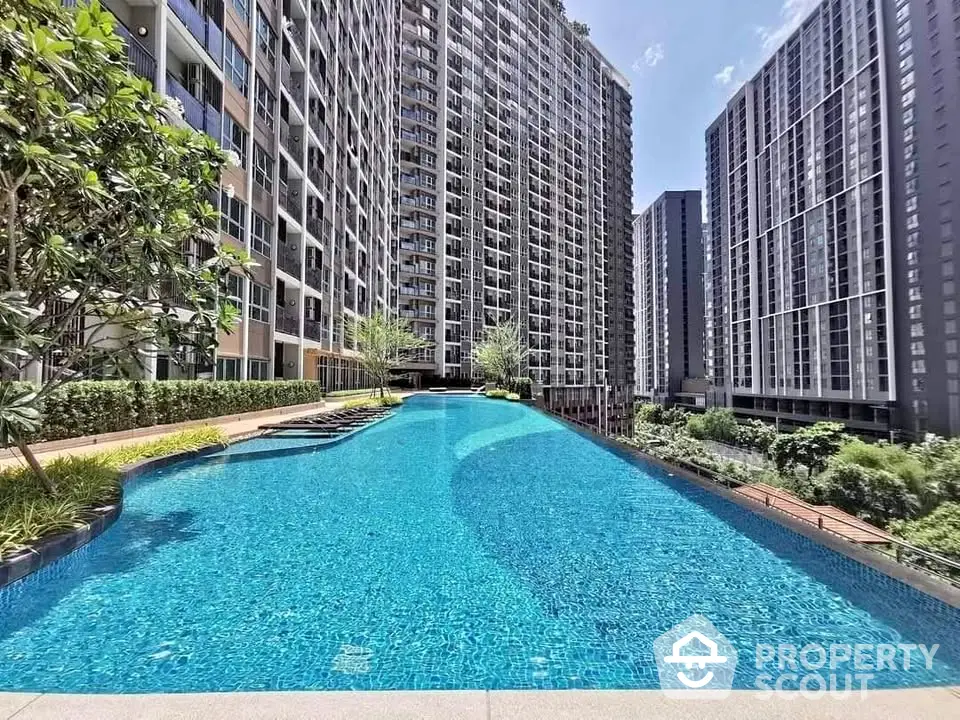 Luxurious condominium with stunning pool and modern architecture