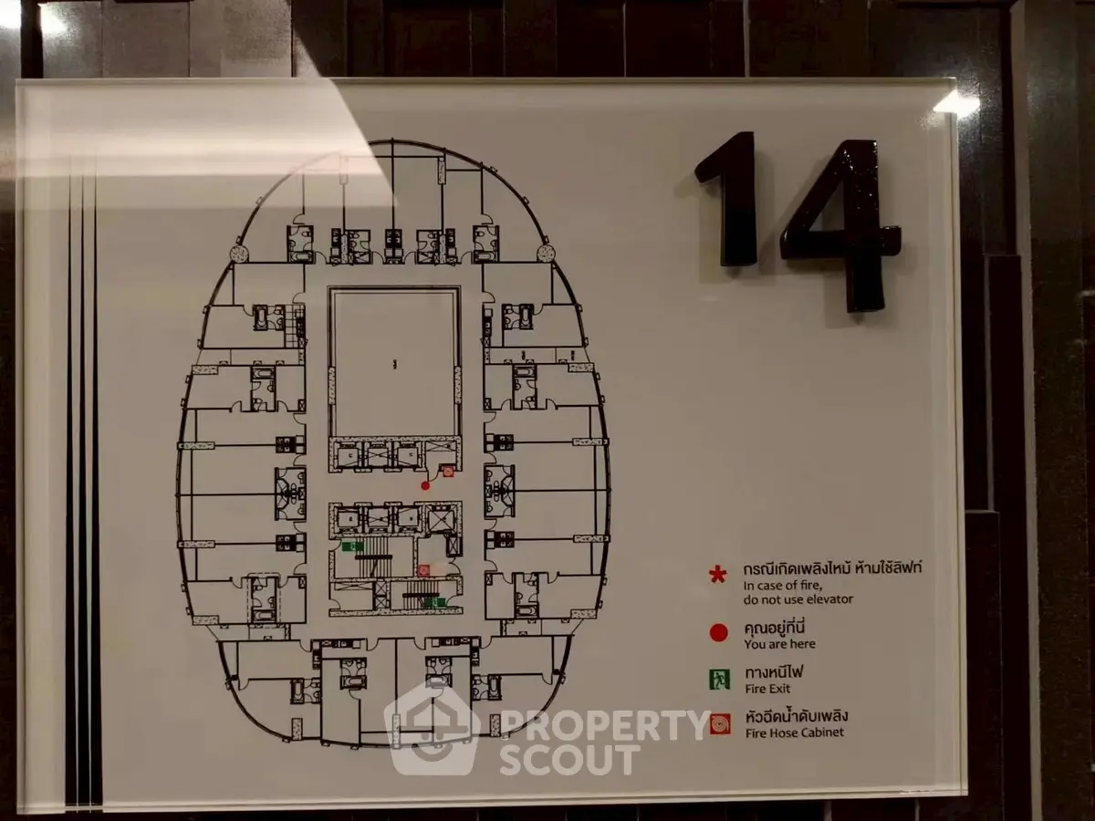 Floor plan of a modern building with emergency instructions on the 14th floor.