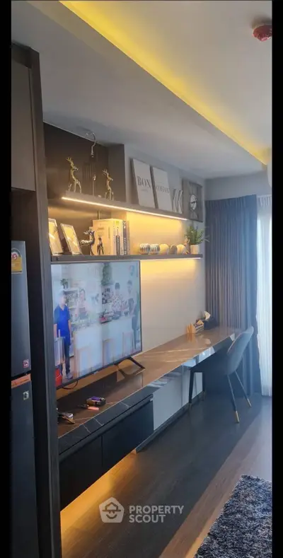 Modern living room with sleek TV setup and stylish decor