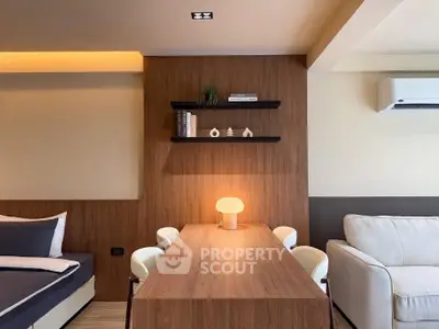 Modern living room with stylish wooden accents and cozy lighting