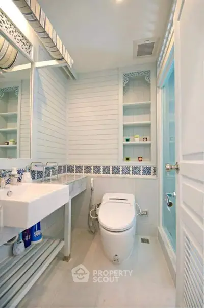 Charming bathroom with modern fixtures and elegant tile accents