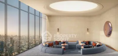 Luxurious living room with panoramic city view and modern circular seating arrangement.